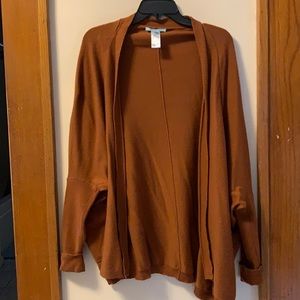 burnt orange colored drapey cardigan